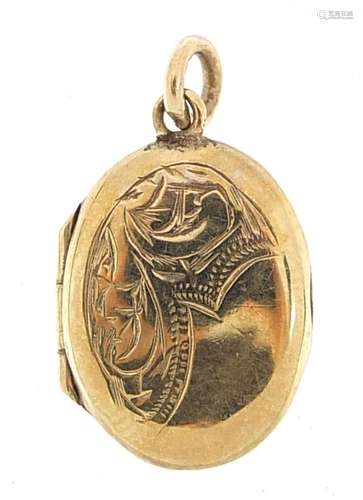 9ct gold oval locket with engraved decoration, 1.7cm high, 1...