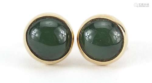 Pair of 9ct gold cabochon jade stud earrings, 9mm in diamete...