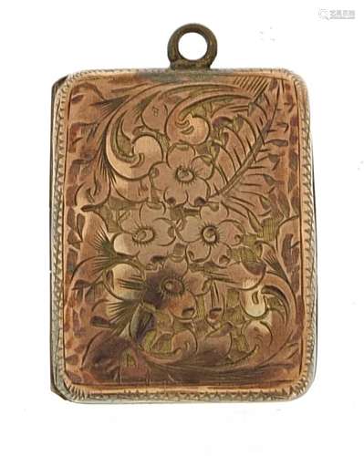 Antique gold coloured metal locket engraved with flowers, 2....