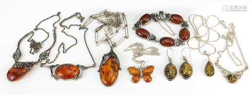 Silver natural amber jewellery comprising three necklaces, f...