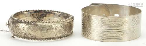 Two silver bangles, one with engraved decoration, 57.8g