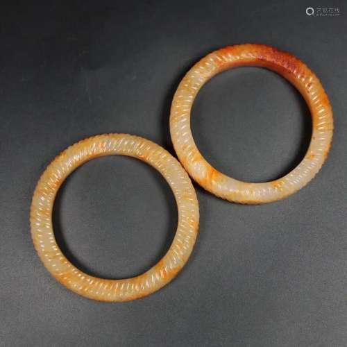 A PAIR OF ARCHAIC JADE CARVING BRACELET BANGLES