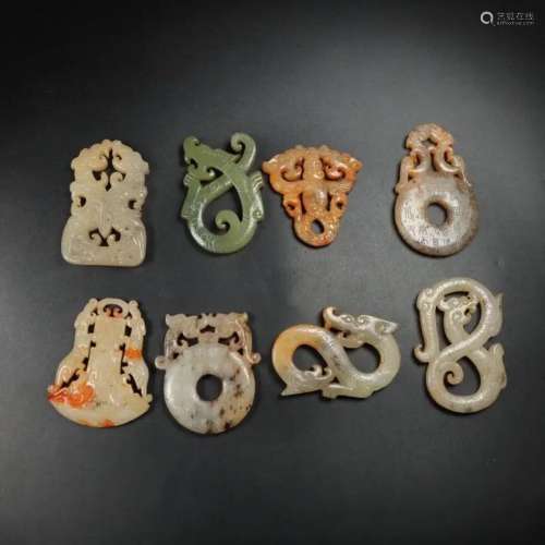 A SET OF ARCHAIC JADE PLAQUES AND PENDANTS