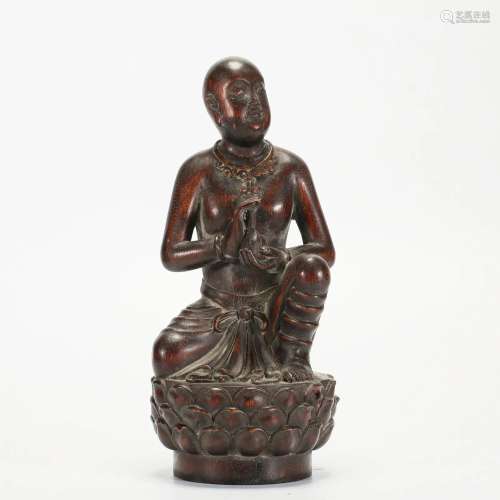 A Carved Aloes-wood Seated Arhat