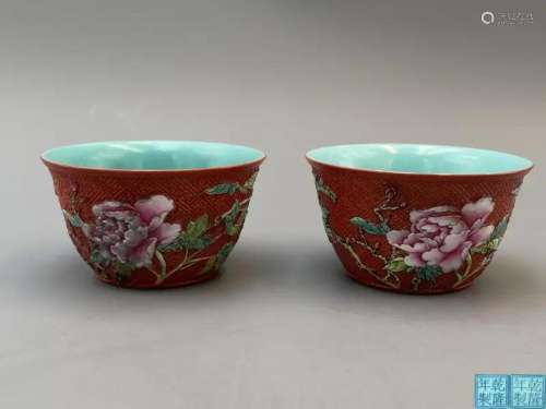 A PAIR OF IRON-RED GLAZED 'PEONY FLOWER' CUPS