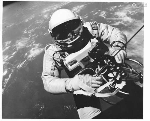 Ed White floats in zero gravity during the first U.S. EVA (2...