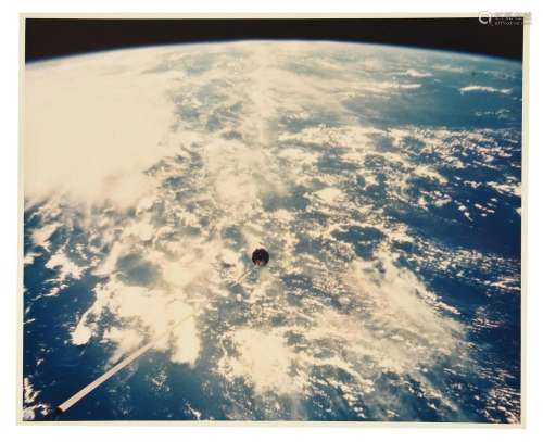 Agena on a tether floating over the clouds, Gemini 11, 12-15...