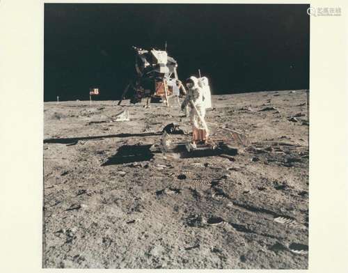 A view of Buzz Aldrin working at the seismometer, Apollo 11,...