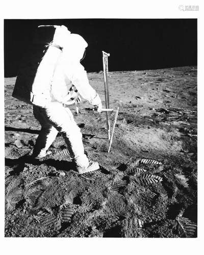 Buzz Aldrin takes a core sample of lunar soil, Apollo 11, 16...