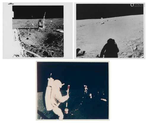 Views of the crew deploying scientific experiments (3 views)...