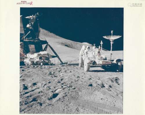 View of James Irwin working at the Rover next to the Lunar M...