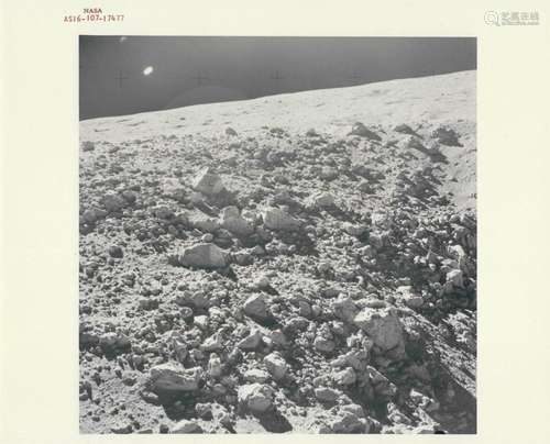 Debris-strewn terrain at Station 4, EVA 2 Apollo 16, 16-27 A...