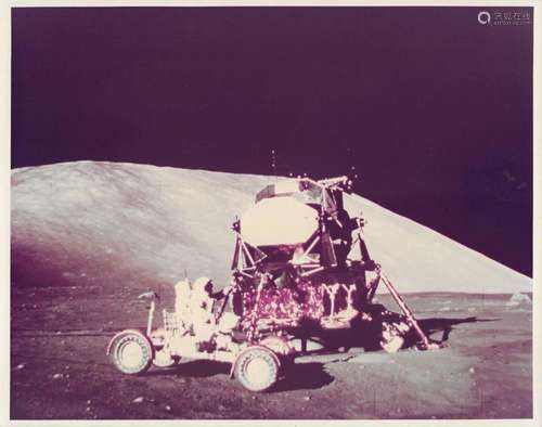 Gene Cernan performs a test drive in the Rover by the Lunar ...