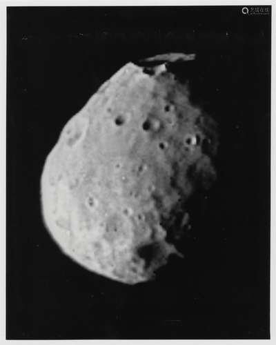 The first view of Phobos, the Martian moon, Viking Orbiter 1...