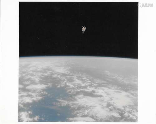 Bruce McCandless floats over Earth during the first untether...