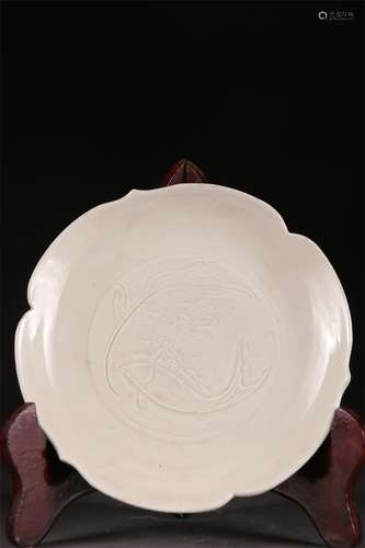 A White Glazed Porcelain Saucer, Ding Kiln.