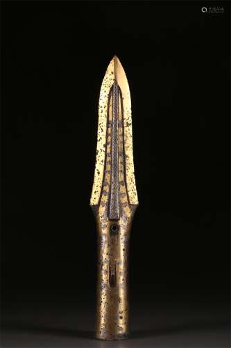 A Copper Weapon Accessory with Gold Inlay.