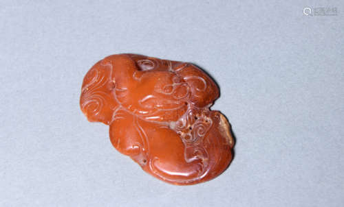 Carved Amber Lion Ornament