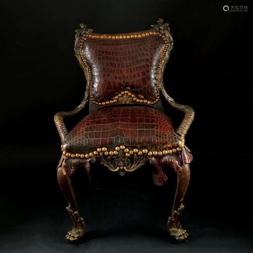 A walnut exotic leather covered armchair, Paris, Michel Hail...