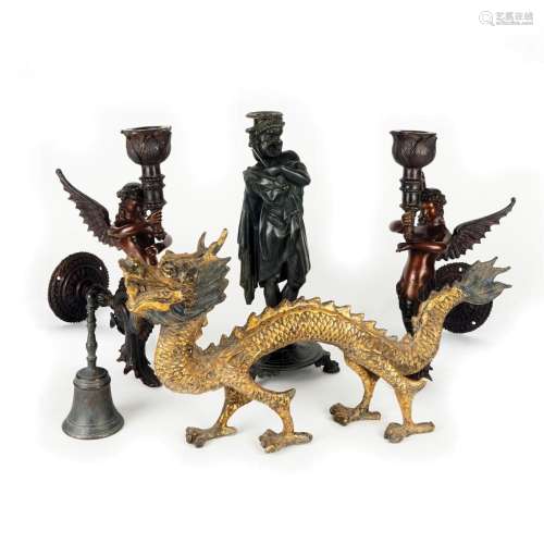 A gilded metal sculpture of a dragon, 23by42cm.