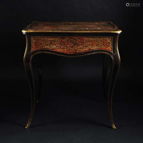 A French ebonized inlaid table, 19th century