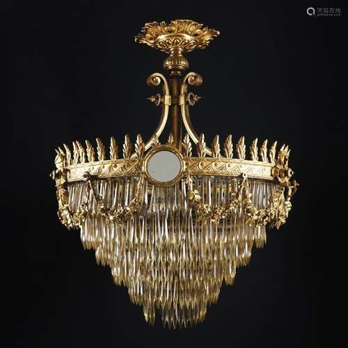 A chiseled gilded bronze circular chandelier