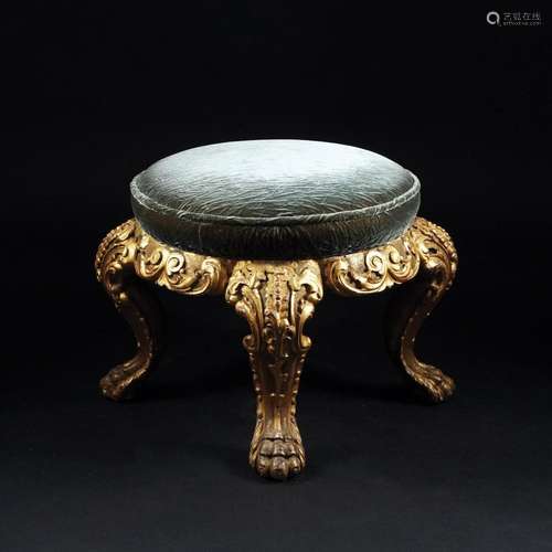 A gilded wood and carved circular Tabouret with padded seat,...