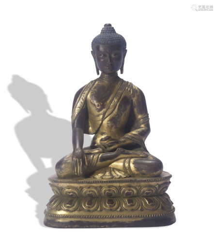 A gilt-bronze statue of Sakyamumi