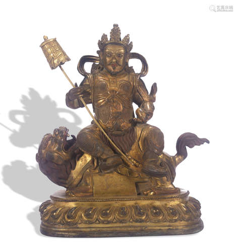 A gilt-bronze statue of Mammon