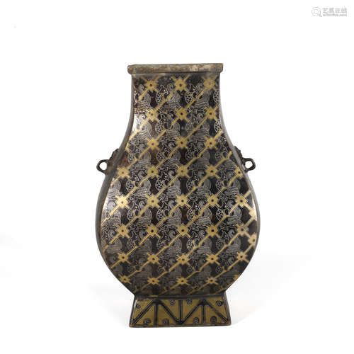 A bronze vase ware with gold and silver