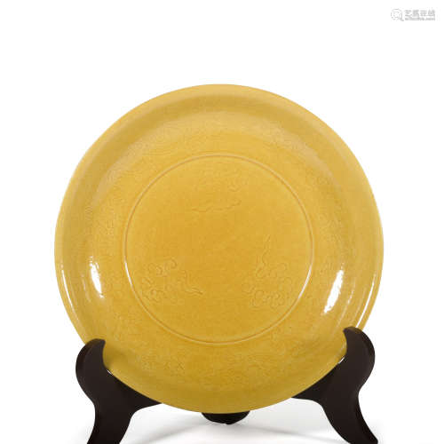 A yellow glazed 'dragon' dish