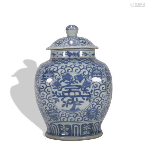 A blue and white jar and cover