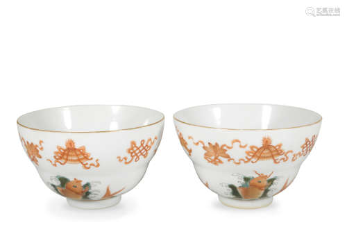 A pair of allite red glazed bowl