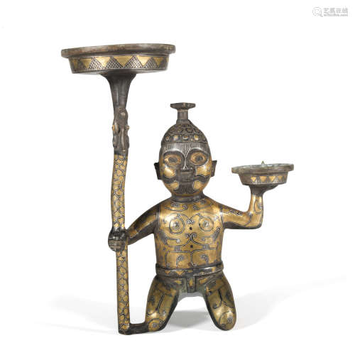 A bronze figure ware with gold and silver