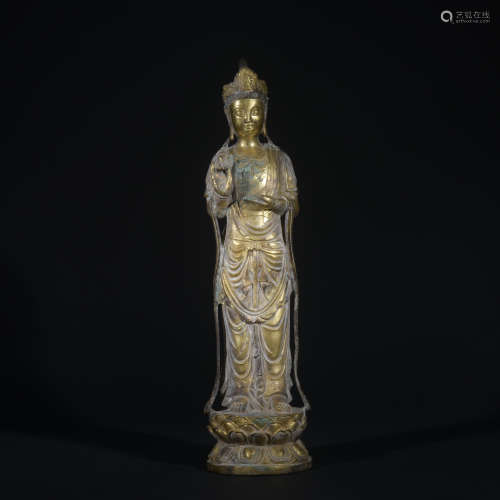 A gilt-bronze statue of Guanyin