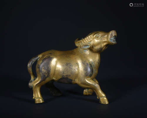 A gilt-bronze cattle