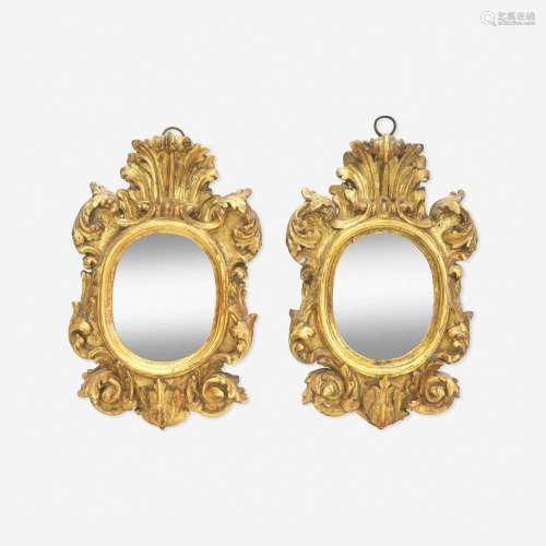 A Pair of Italian Baroque Carved Giltwood Mirrors 17th centu...