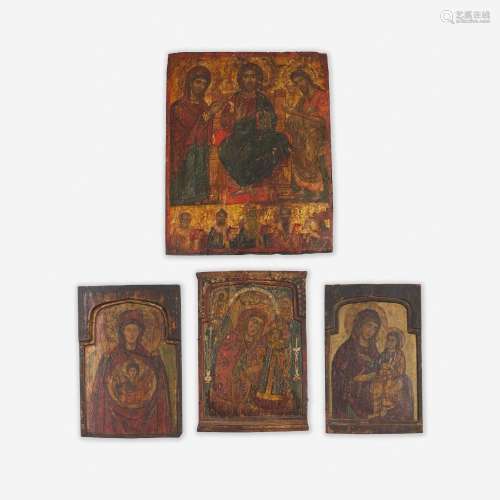 A Group of Four Polychrome and Gilt Painted Panel Icons Russ...