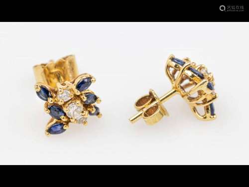 Pair of 18 kt gold earrings with sapphires and brilliants