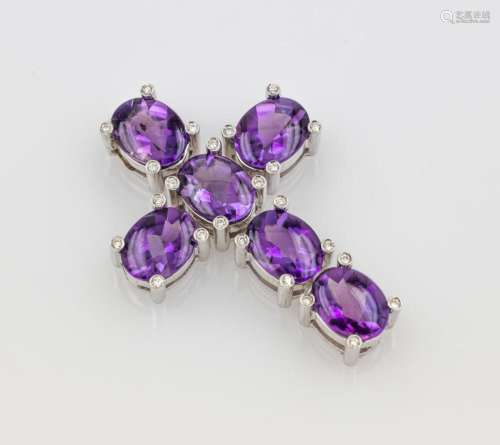 18 kt gold crosspendant with amethysts and brilliants