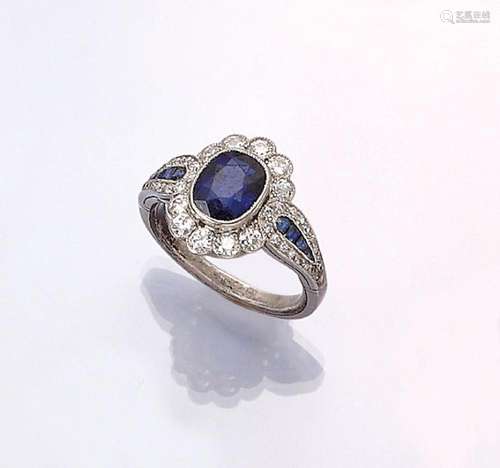 Platinum ring with sapphires and diamonds