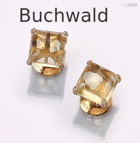 Pair of 18 kt gold earrings with brilliants and lemoncitrine...