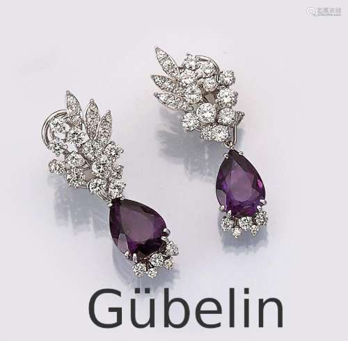 Pair of 18 kt gold GÜBELIN ear clips with brilliants and ame...