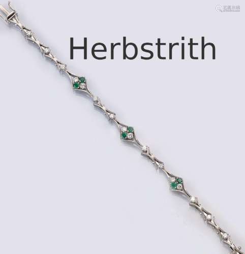THEODOR HERBSTRITH 18 kt gold bracelet with emeralds and bri...