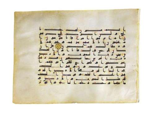 A Large Uncut Qur’an leaf in Kufic script on vellum, North A...