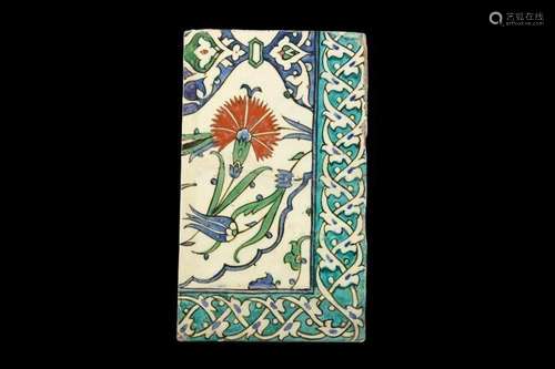 A 16TH CENTURY TURKISH GLAZED POTTERY IZNIK TILE