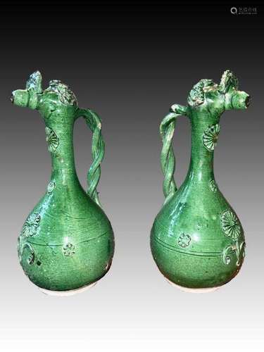 A PAIR OF NEAR-IDENTICAL GREEN-GLAZED ÇANAKKALE EWERS OTTOMA...