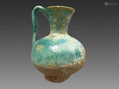 A KASHAN TURQUOISE GLAZED BOTTLE CENTRAL PERSIA, CIRCA 1200