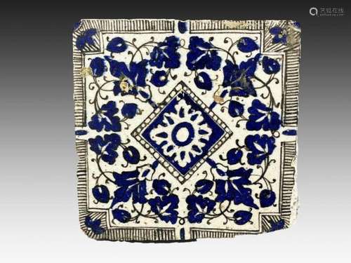 A SYRIAN GLAZED POTTERY TILE