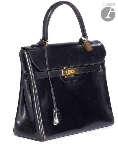 HERMèS Paris
Sac Monaco en box noir (quelques rayures et tra...